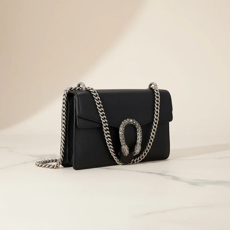 Gucci Dionysus small shoulder bag in black leather with antique silver tiger head closure, front view