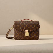 Louis Vuitton Pochette Metis crossbody bag in Monogram canvas with S-lock flap, top handle and adjustable strap