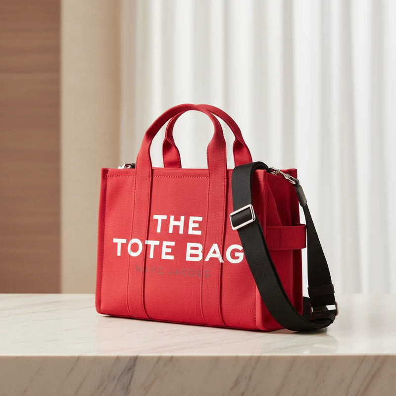Marc Jacobs The Large Tote Bag in cotton canvas with logo print, front view